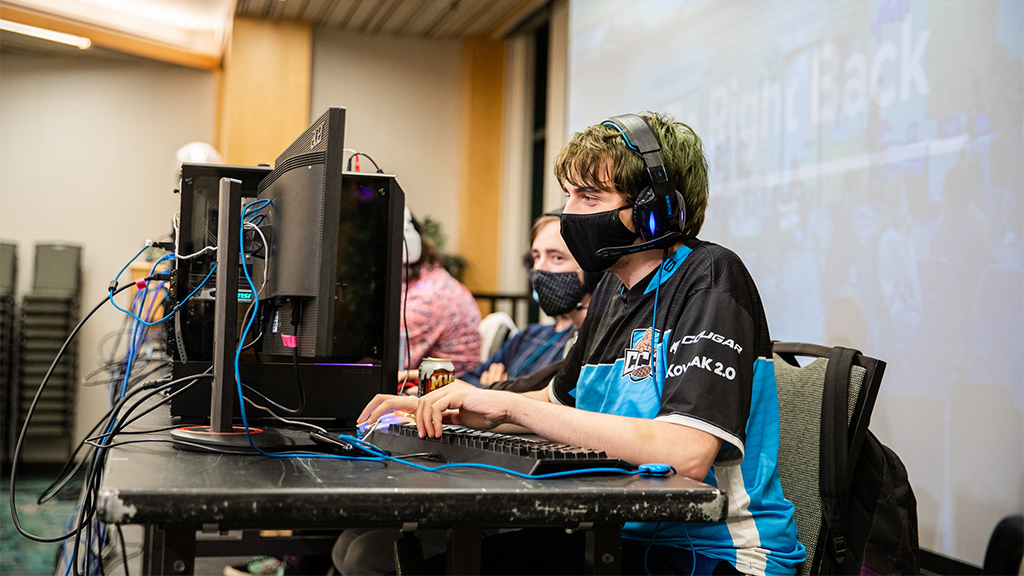 Students taking part in a fundraiser esports event