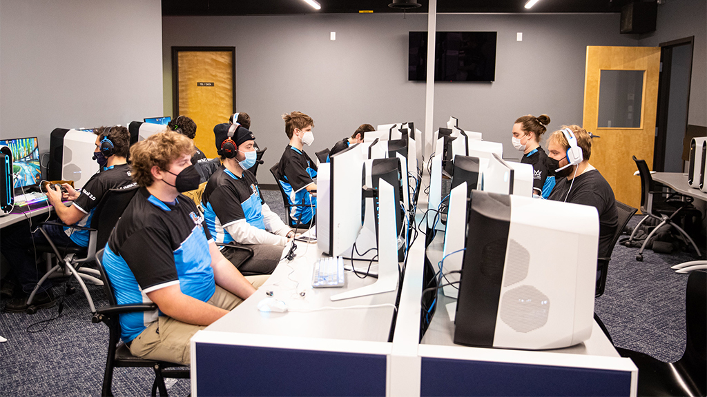 Group of students competing in esports in their studio