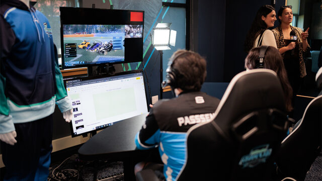 Student using a computer station in the esports arena