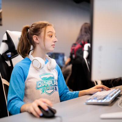 Student playing games in the esports arena